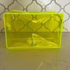 Drunk Elephant neon cosmetic bag